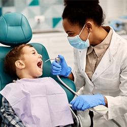 Young boy smiling at dentist's office 