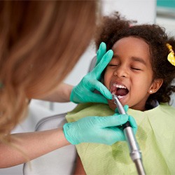 Little girl getting fluoride treatment 