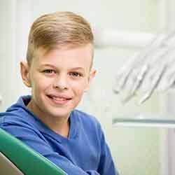 Young boy in dentist’s chair