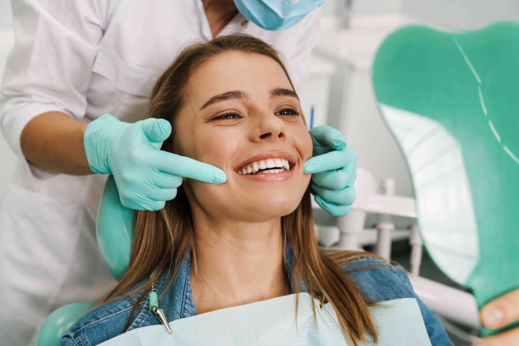 Woman smiling in the dental chair